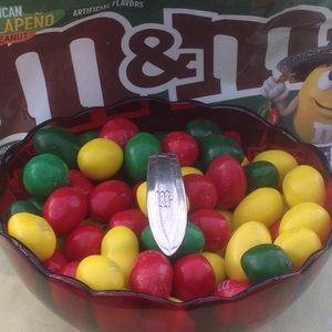 "M" monogrammed pendant made from vintage spoon.